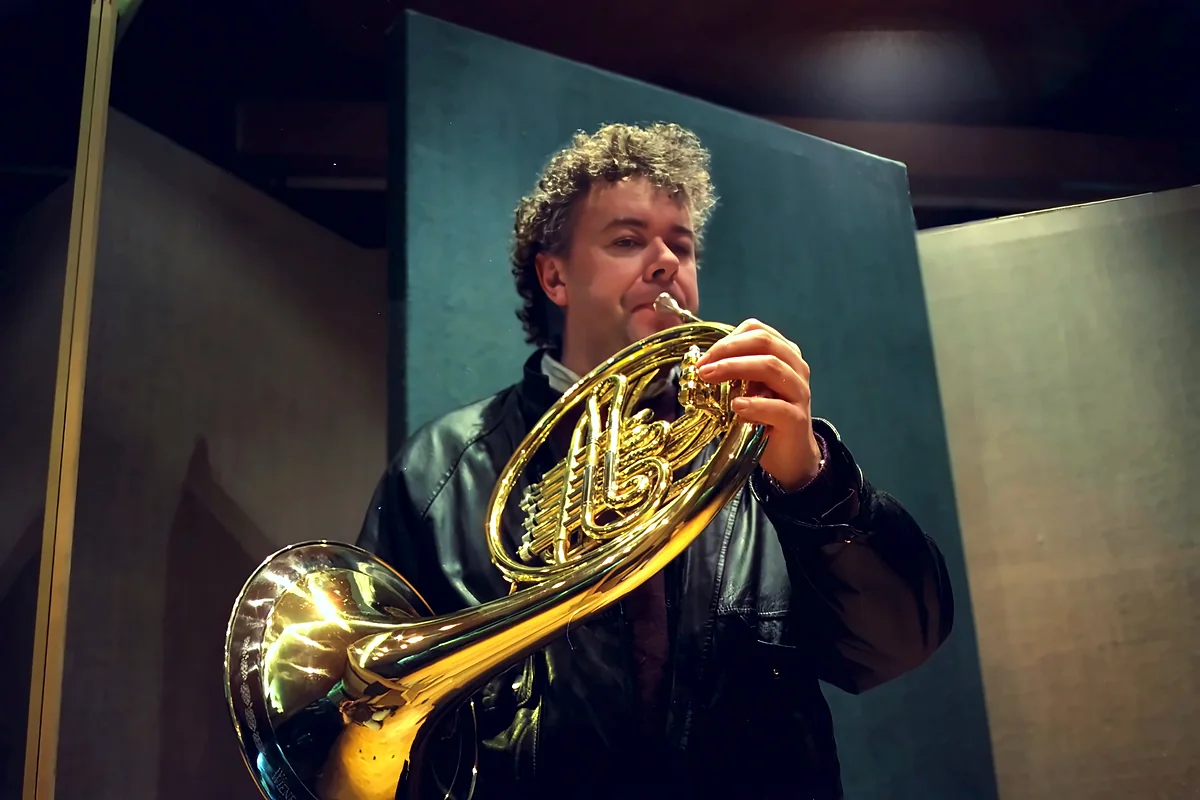 Anthony Gustav Morris playing the French horn