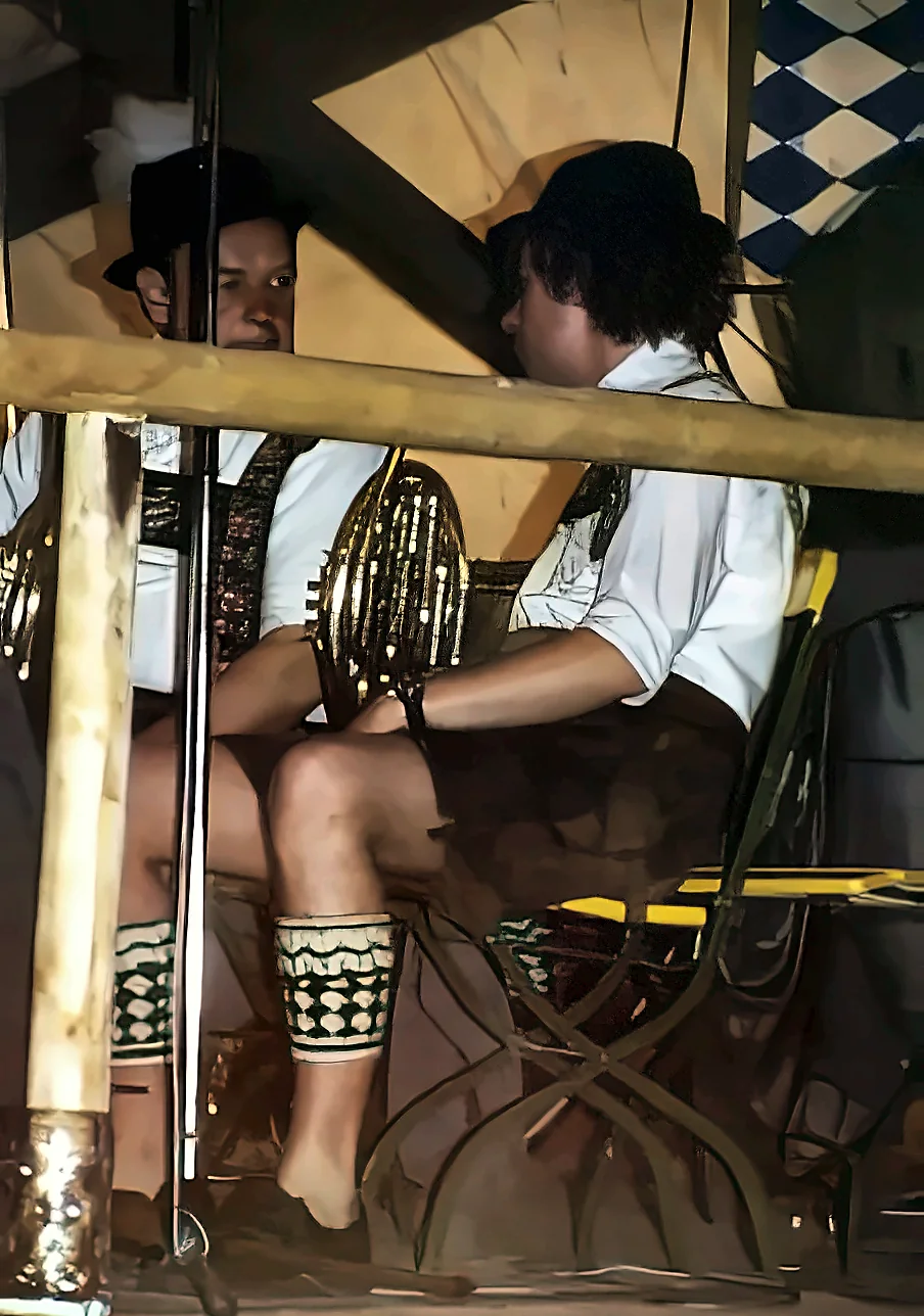 Anthony Gustav Morris playing horn in traditional dress