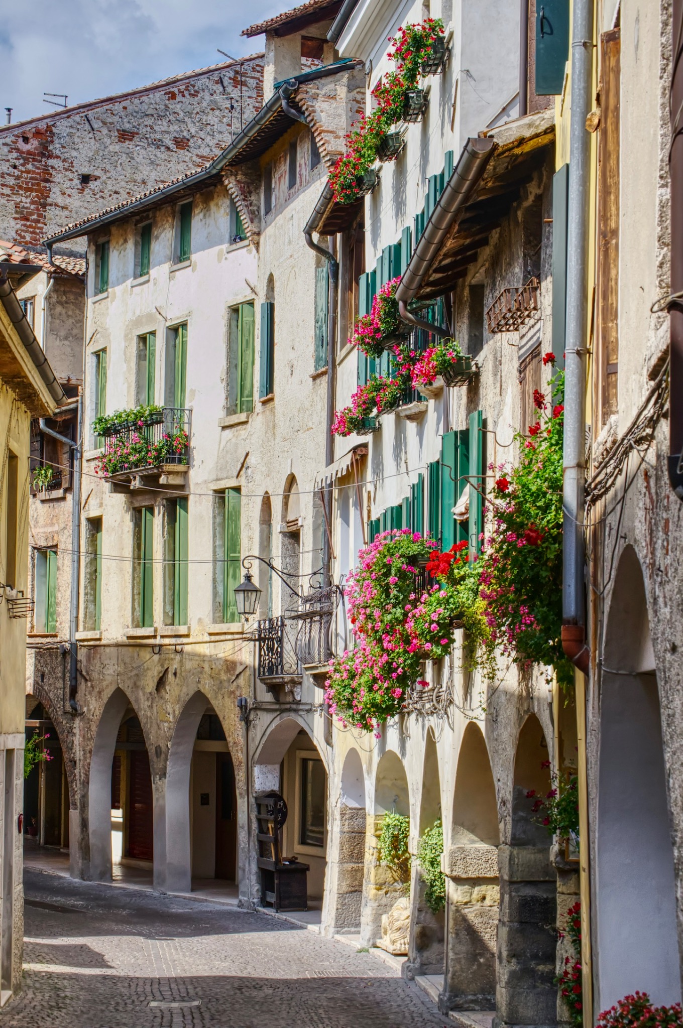 Flowered balconies and arcades in Asolo