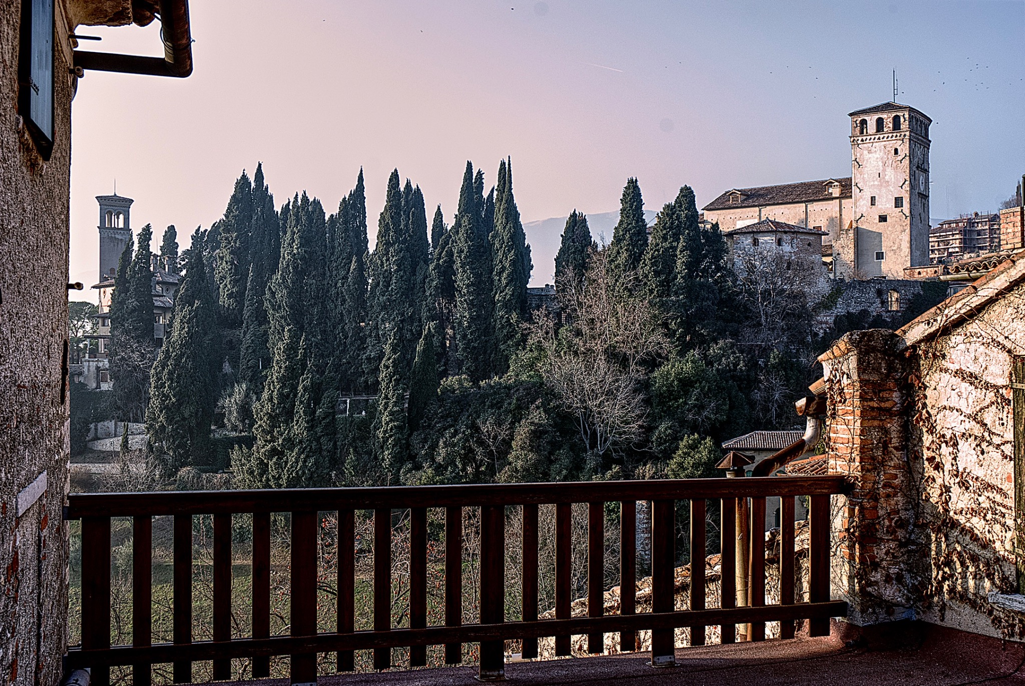 Tower and cypresses on the hillside above Asolo