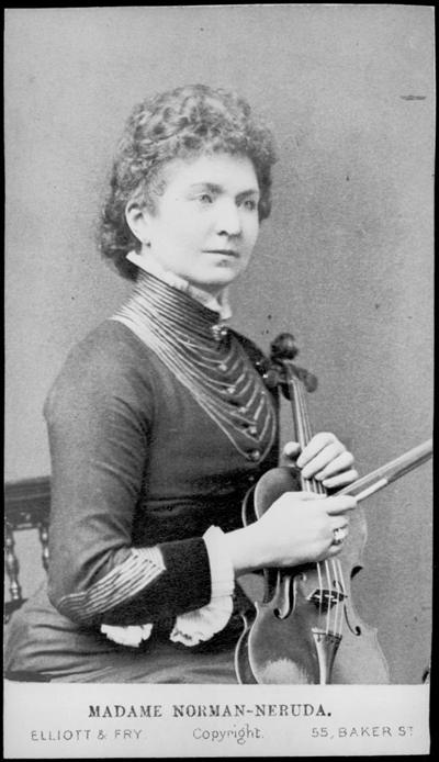Wilma Neruda, later Lady Hallé, holding a violin; an undated portrait by Elliott and Fry